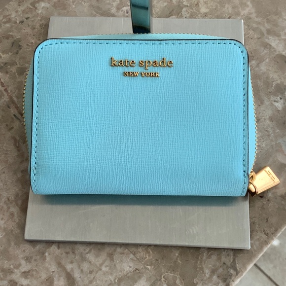 kate spade Handbags - kate spade light aqua zip-around card wallet with gold hardware